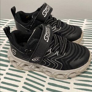 Skechers Light up Black and White Sneakers with Chunky Sole and Slip-On Design